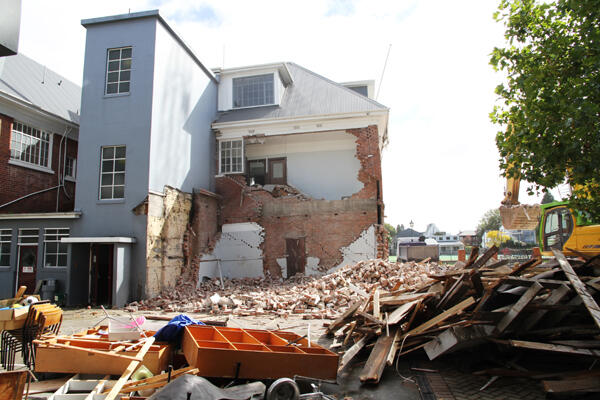 Early phases of the demolition of the Statham building at the Cathedral Grammar School.
