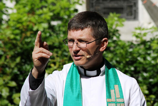 The Rev Mark Chamberlain pronounces the blessing at St Barnabas, Fendalton.