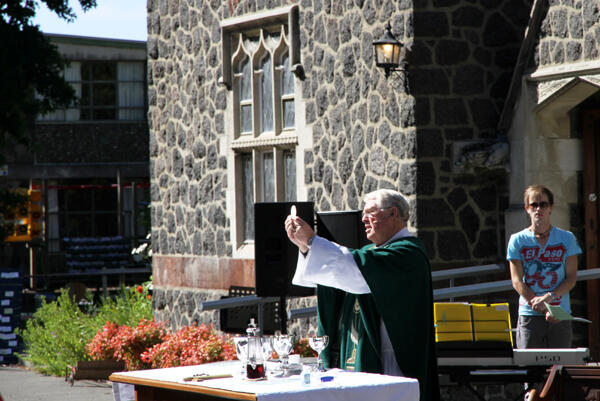 The Rev Philip Robinson celebrates The Great Thanksgiving outside St Barnabas Fendalton.