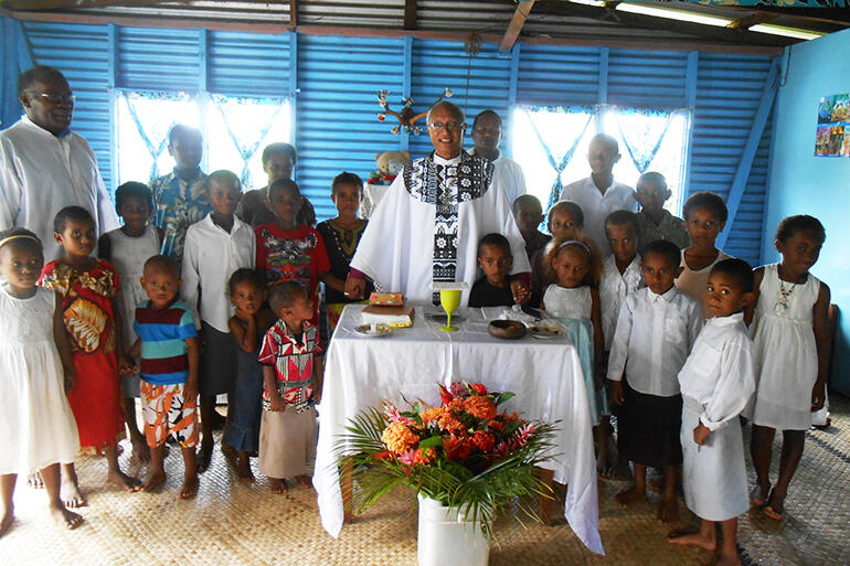 Easter Day, 2014, in the chief's home at Maniava. This was destroyed in the cyclone, and the chief's family survived by sheltering under the floor. Easter Day, 2014, in the chief's home at Maniava. This was destroyed in the cyclone, and the chief's family survived by sheltering under the floor.