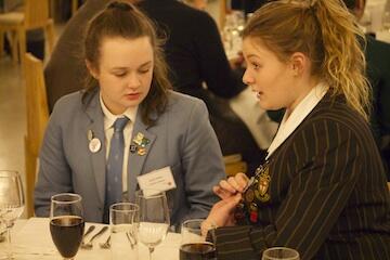 Sarah Hurdle (St Hilda’s Collegiate) and Briana Allan (Nga Tawa) compare badges. 