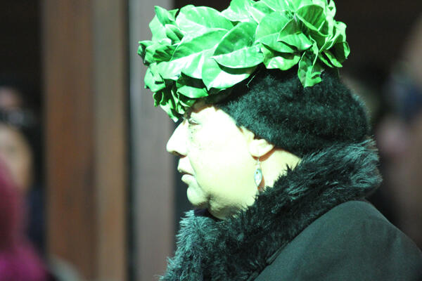 One of kaikaranga, wearing her wreath of puririri leaves, who called mourners into the church. One of kaikaranga, wearing her wreath of puririri leaves, who called mourners into the church.