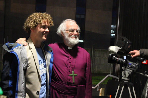 Archbishop Rowan with Sam Johnson, the young inspiration behind the volunteers' rock concert in Christchurch. Archbishop Rowan with Sam Johnson, the young inspiration behind the volunteers' rock concert in Christchurch.