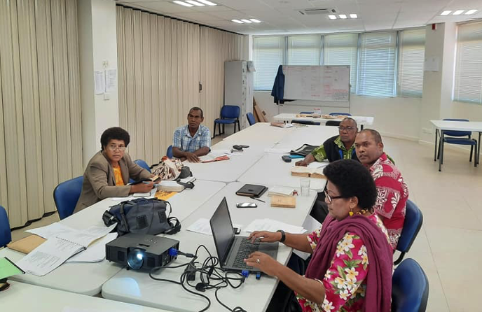 Fijian translators meet to work on further Prayer Book texts projected on screen at the Moana Anglican Services and Teaching Centre in Suva, 2020.