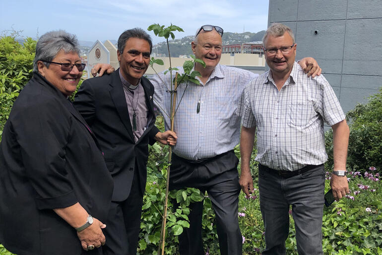 Bishop Waitohiariki Quayle and Canon Robert Kereopa join David and Grant Hadfield to plant a centenary celebration tree.