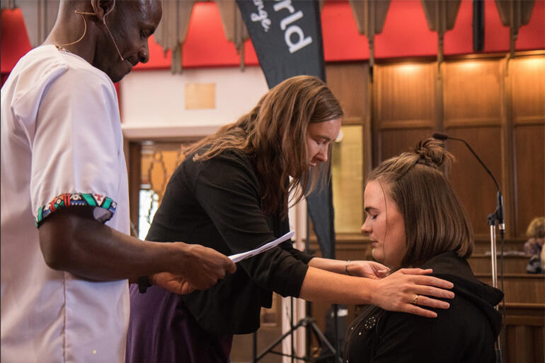 Bishop Eleanor Sanderson and Steve Maina pray for Anna Smart as she heads into the Better World gap year. Bishop Eleanor Sanderson and Steve Maina pray for Anna Smart as she heads into the Better World gap year.