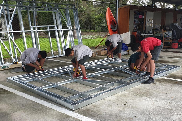 Dilworth Year 9 students begin work on the foundation structures for the sleepout building project. Dilworth Year 9 students begin work on the foundation structures for the sleepout building project.