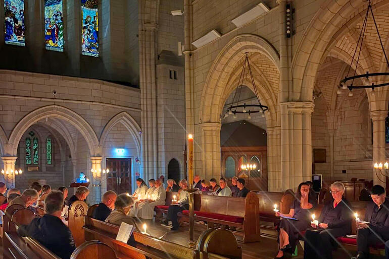 St Matthews in the City Auckland sit in choir to hear a reading during their 2026 Easter Vigil on Holy Saturday evening.