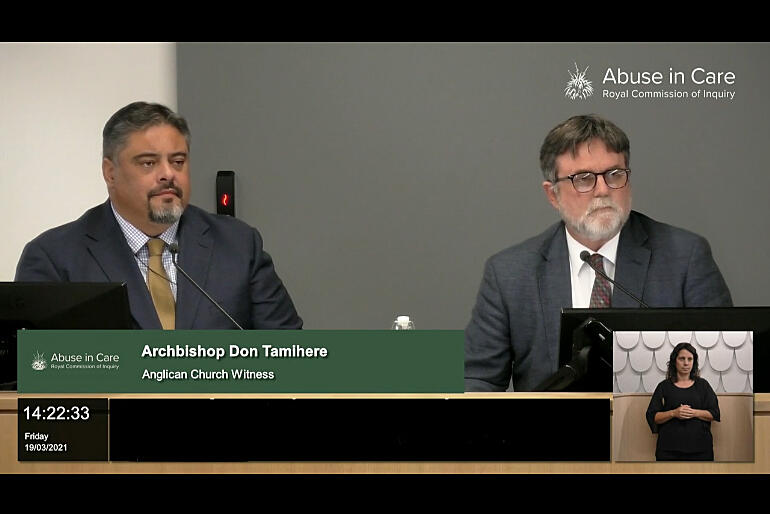 Archbishop Don Tamihere and Archbishop Philip Richardson listen to a legal representative during the 19 March faith-based hearing.