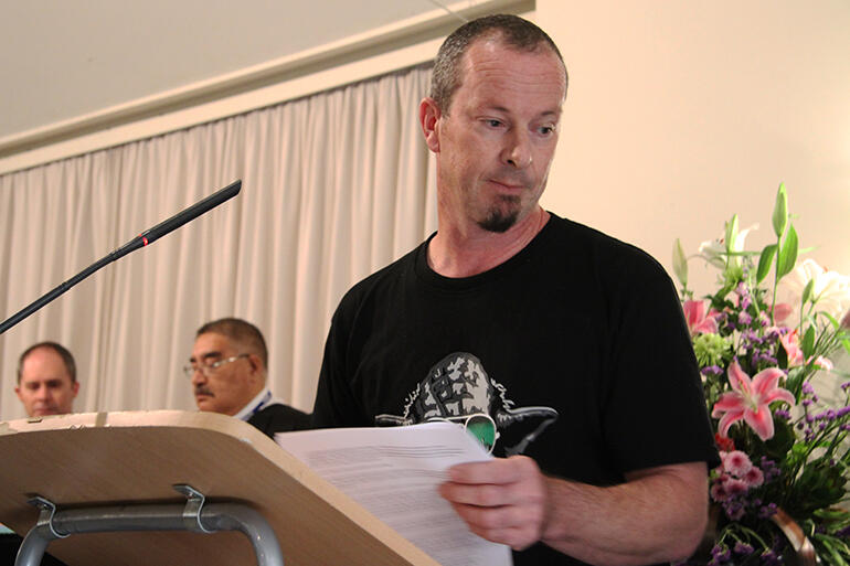 The Rev Dr Andrew Burgess of Nelson steps from the podium, having read the key parts of the motion to synod.