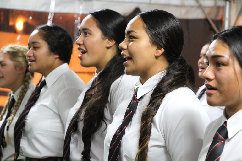 Erehana Taumaunu and Te Aomania Te Koha sing in one voice.