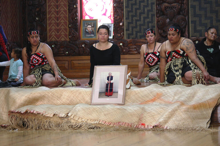 A portrait of the late Archbishop Jabez Bryce is flanked by Maori women during the General Synod powhiri. A portrait of the late Archbishop Jabez Bryce is flanked by Maori women during the General Synod powhiri.