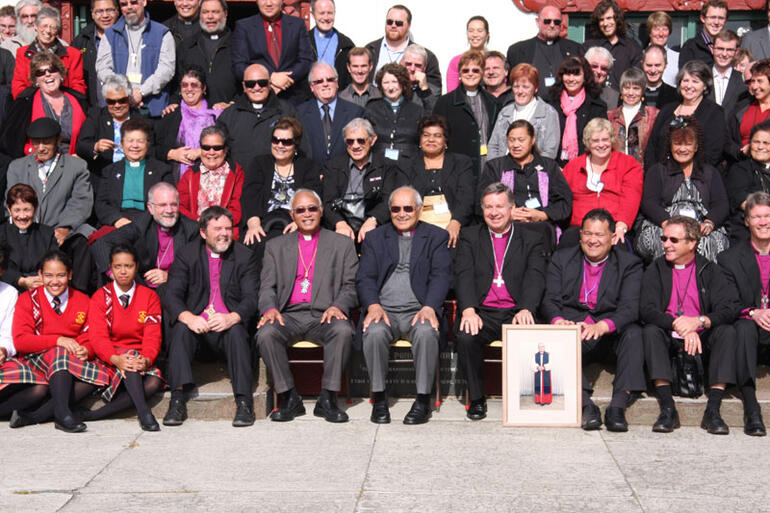 On the steps leading into the wharenui at Poho o Rawiri - with Archbishop Jabez's portrait still prominent. On the steps leading into the wharenui at Poho o Rawiri - with Archbishop Jabez's portrait still prominent.