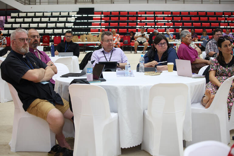 Diocese of Waiapu delegates listen as mover and seconder set out the climate resilience motion. 