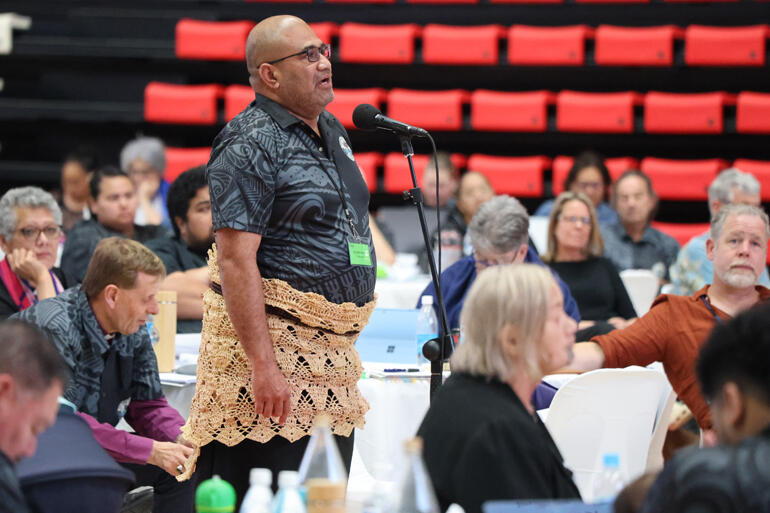 Viliami Folau, a founding CIVA trainer for the Diocese of Polynesia stands to support the motion.