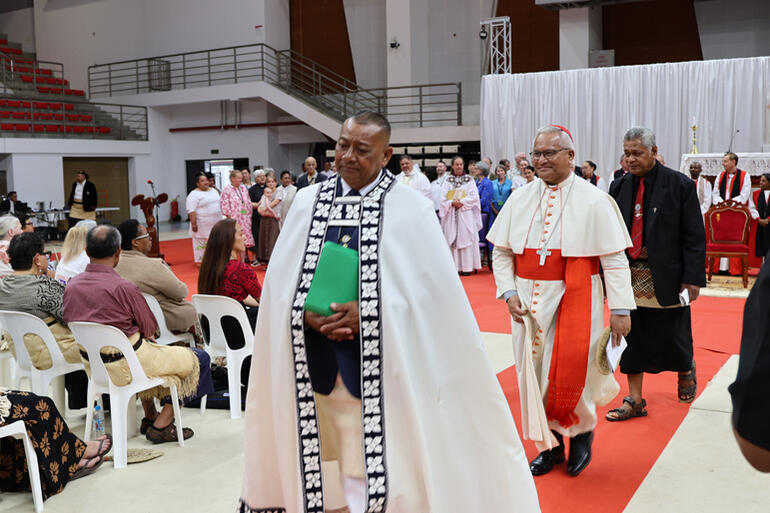 Cardinal Saone Mafi, the Catholic Bishop of Tonga processes out along with other distinguished guests.