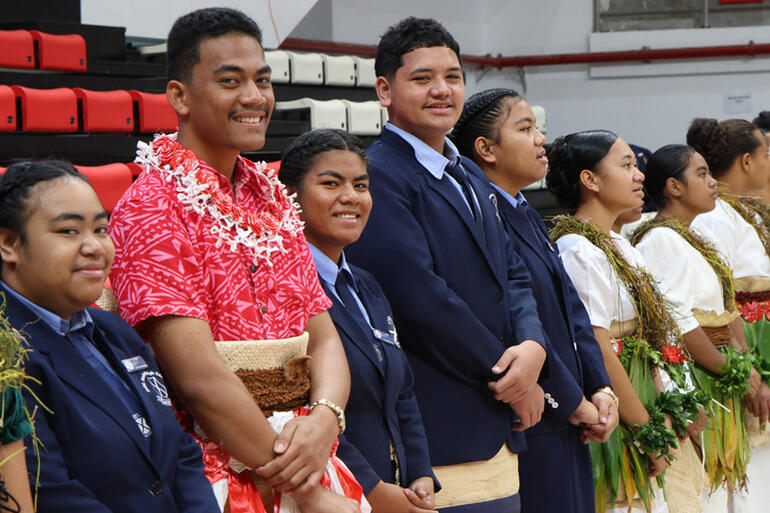 Tongan Anglican students line up ready to process the Gospel later in the service.