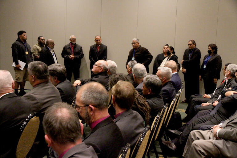 Members of the Diocese of Polynesia support Fr Orisi Vuki in song.