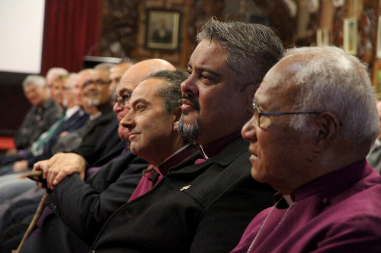 Archbishop Don Tamihere hears the story from Archdeacon Tiki. Archbishop Don Tamihere hears the story from Archdeacon Tiki.