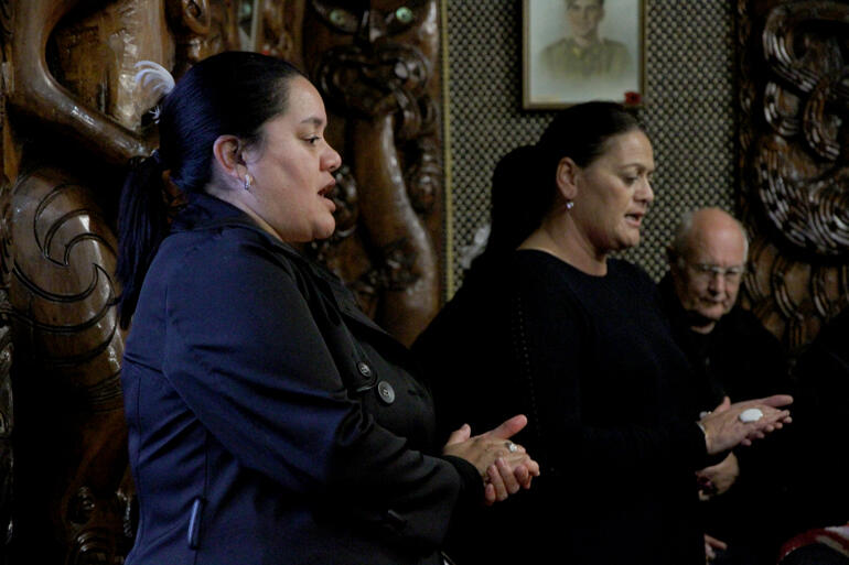 Te Atiawa iwi's Trust chair Liana Poutu (left) sings to support the Taranaki speakers. Earlier she called synod onto Owae as kaikaranga. Te Atiawa iwi's Trust chair Liana Poutu (left) sings to support the Taranaki speakers. Earlier she called synod onto Owae as kaikaranga.