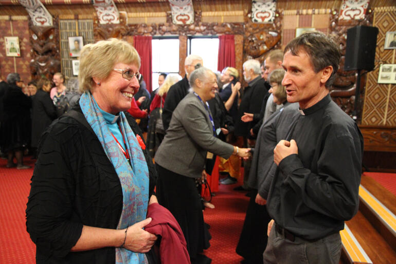 Ven Helen Roud (Christchurch) shares a smile with Rev Stephen Prebble (Waikato-Taranaki) at the end of yesterday's hongi line in Te-Ika-Roa-a-Maui. Ven Helen Roud (Christchurch) shares a smile with Rev Stephen Prebble (Waikato-Taranaki) at the end of yesterday's hongi line in Te-Ika-Roa-a-Maui.