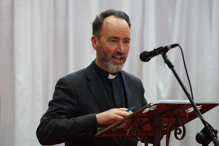The Ven Dr Michael Wallace presents Motion #8 committing the Anglican Church in these islands to actions for peace in the Holy Land.