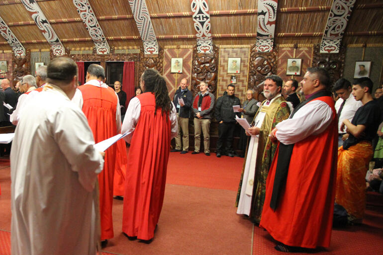 Bishops from across the motu process in to the opening hymn. Bishops from across the motu process in to the opening hymn.