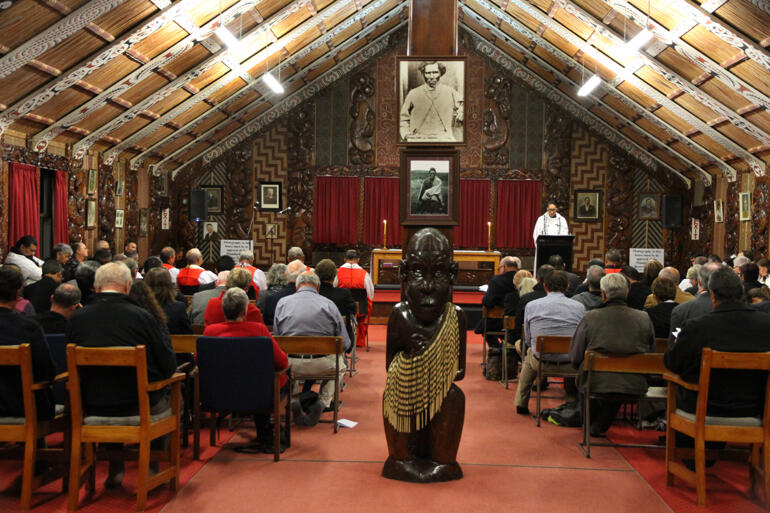 The Rev Mele Prescott leads the prayers of the people inside Te-Ika-Roa-a-Maui wharenui in Waitara. The Rev Mele Prescott leads the prayers of the people inside Te-Ika-Roa-a-Maui wharenui in Waitara.