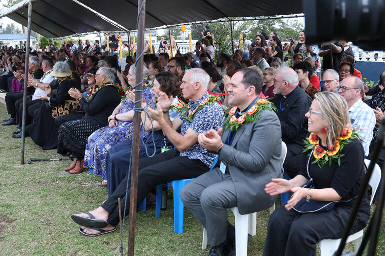 Dean of Christchurch V. REv Ben Truman joins fellow Synod members to applaud the St Andrew's students and Tonga Anglican youth.