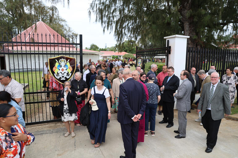 Members of Te Hīnota Whānui exit the Palace gates.