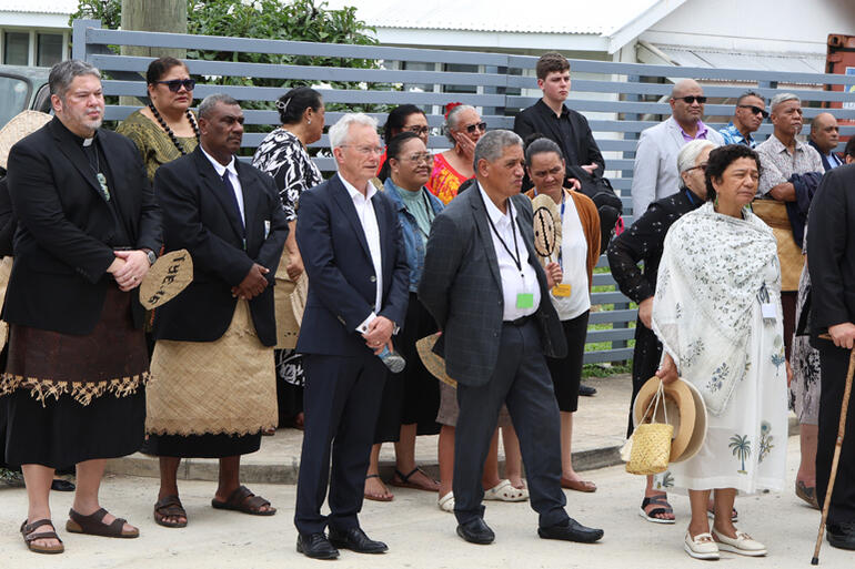 Synod delegates and dignitaries learn the kawa of the King of Tonga's Palace at its gates.