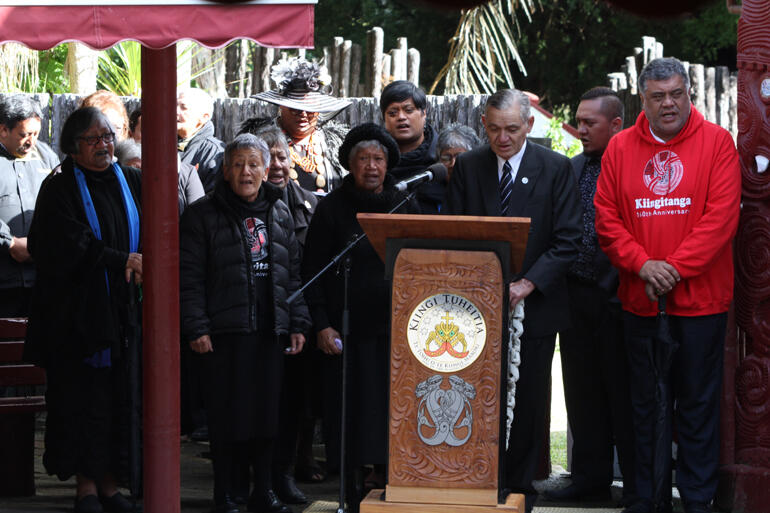 Kingi Tuheitia surrounded by the waiata of his supporters.