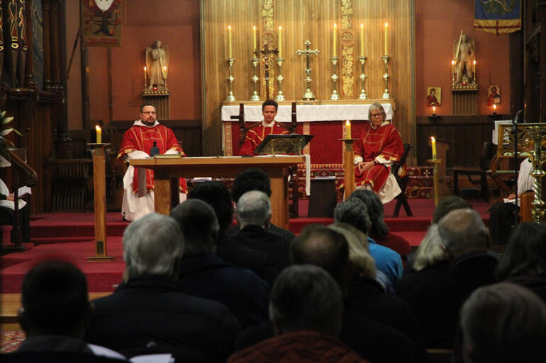 A quiet moment in the liturgy at the Anglo-Catholic Hui. A quiet moment in the liturgy at the Anglo-Catholic Hui.