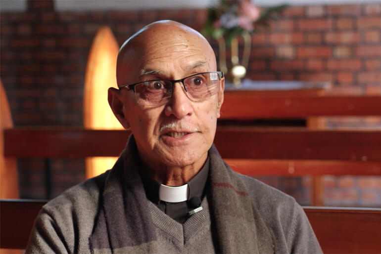 Rev Hone Kaiwai speaks from within the pews at Pātoromu during interviews for He Taonga Tuku Iho 3D scan project.