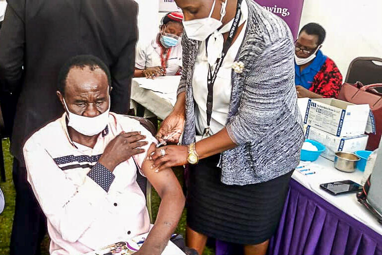 Rev Canon Grace Kaiso, former Christian Council of Uganda Gen Sec. & Anglican Alliance adviser receives his Covid-19 vaccine in Uganda.