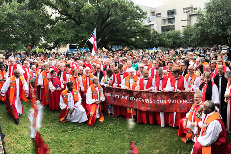 Bishops united against gun violence - in a downtown Austin park. Bishops united against gun violence - in a downtown Austin park.
