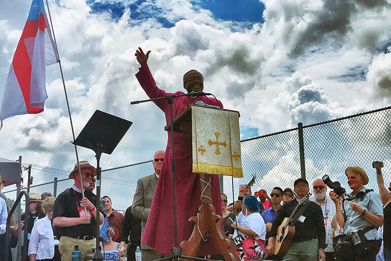 "We do not come to put anybody down." Bishop Curry during the Prayer of Vision, Witness and Justice outside the detention centre. "We do not come to put anybody down." Bishop Curry during the Prayer of Vision, Witness and Justice outside the detention centre.