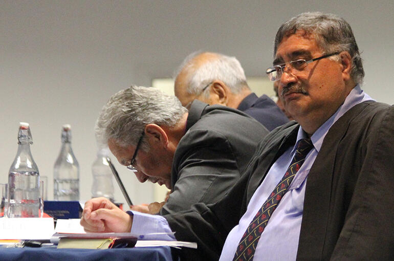 Te Pihopatanga secretary, Charles Hemana, listens to a debate.