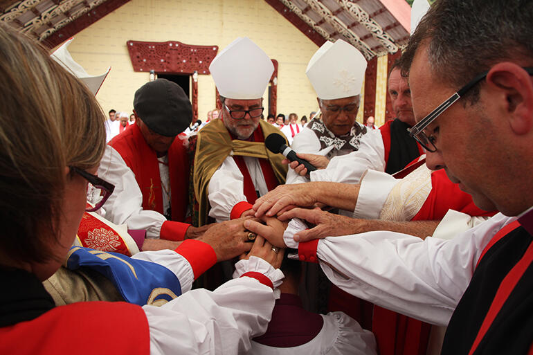 The moment of his ordination. The moment of his ordination.