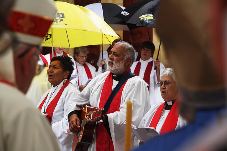The Rev Ben Cameron provides guitar accompaniment - flanked by Revs Mona Scott and Pane Kawhia. The Rev Ben Cameron provides guitar accompaniment - flanked by Revs Mona Scott and Pane Kawhia.