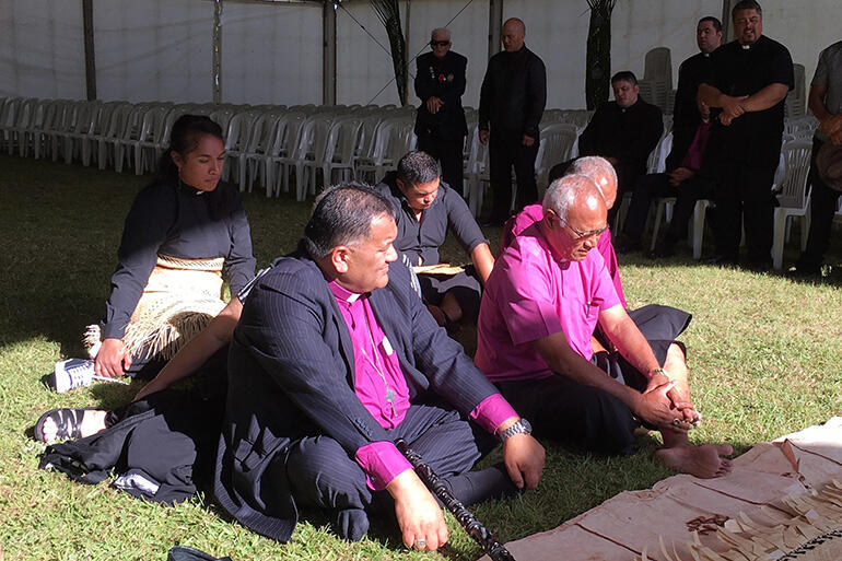 Archbishop Winston Halapua and his ope being welcomed - Bishop Kito translates.