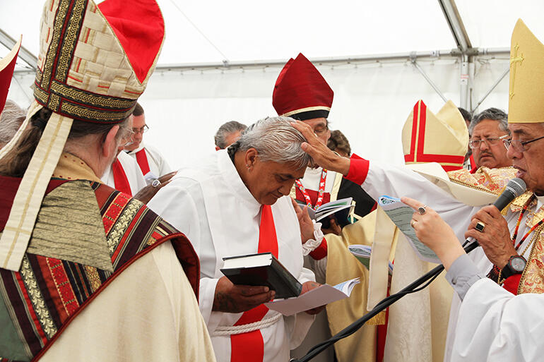 The moment of ordination to the priesthood for The Rev Stace Hakaraia.