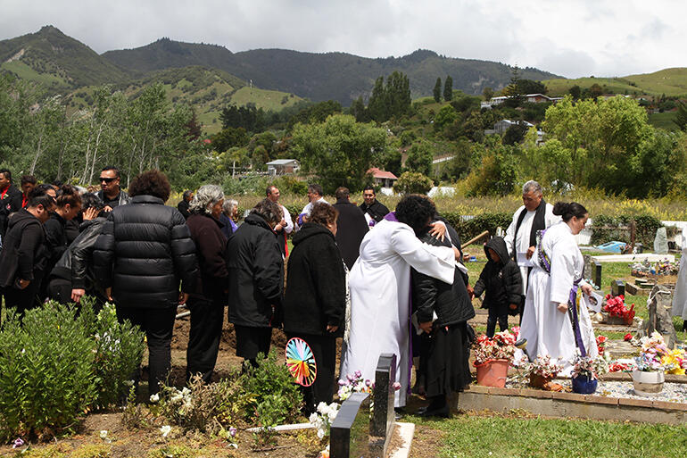 Aroha at his graveside. Aroha at his graveside.