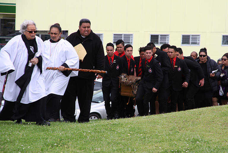 Boys from Te Aute College bear Bishop John to the Tuatini urupa - Bishop John helped saveTe Aute from financial calamity.