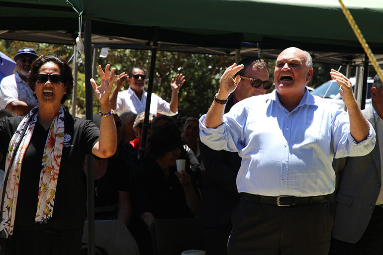 Selwyn Parata leads a waiata - which had lots of willing participants.