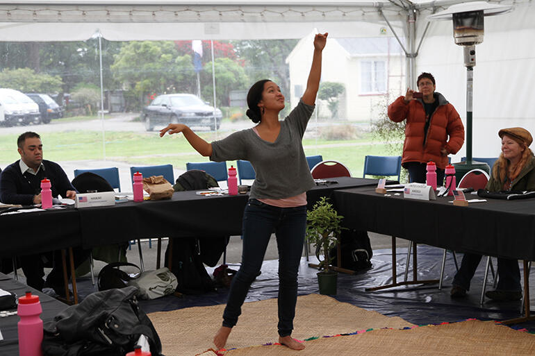 That's Naomi Holokai, performing a traditional hula during Hawaii's turn at leading the evening worship. That's Naomi Holokai, performing a traditional hula during Hawaii's turn at leading the evening worship.