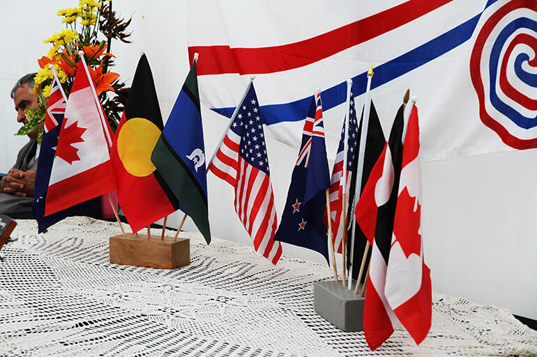 The flags of the nations, and indigenous nations, represented at the conference.