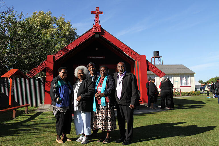 The Torres Strait Island representatives gathered in front of Te Whakaruruhau, the church at Te Wai Pounamu's site.