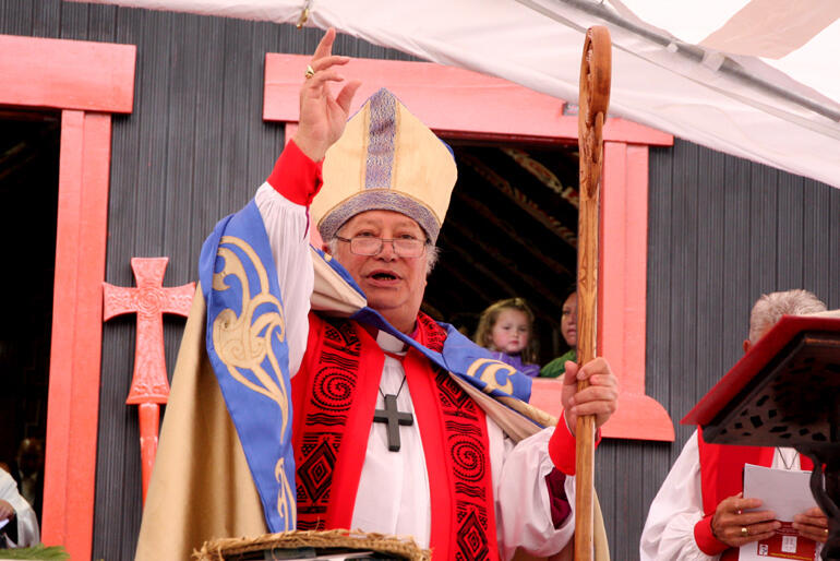 Bishop Richard, newly installed, pronounces the blessing.