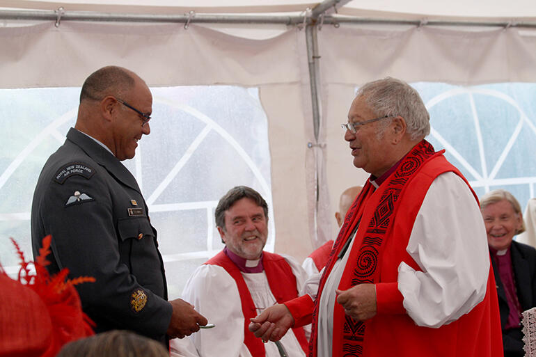 Bishop Rihari surprises Warrant Officer Peter Smith of the RNZAF.